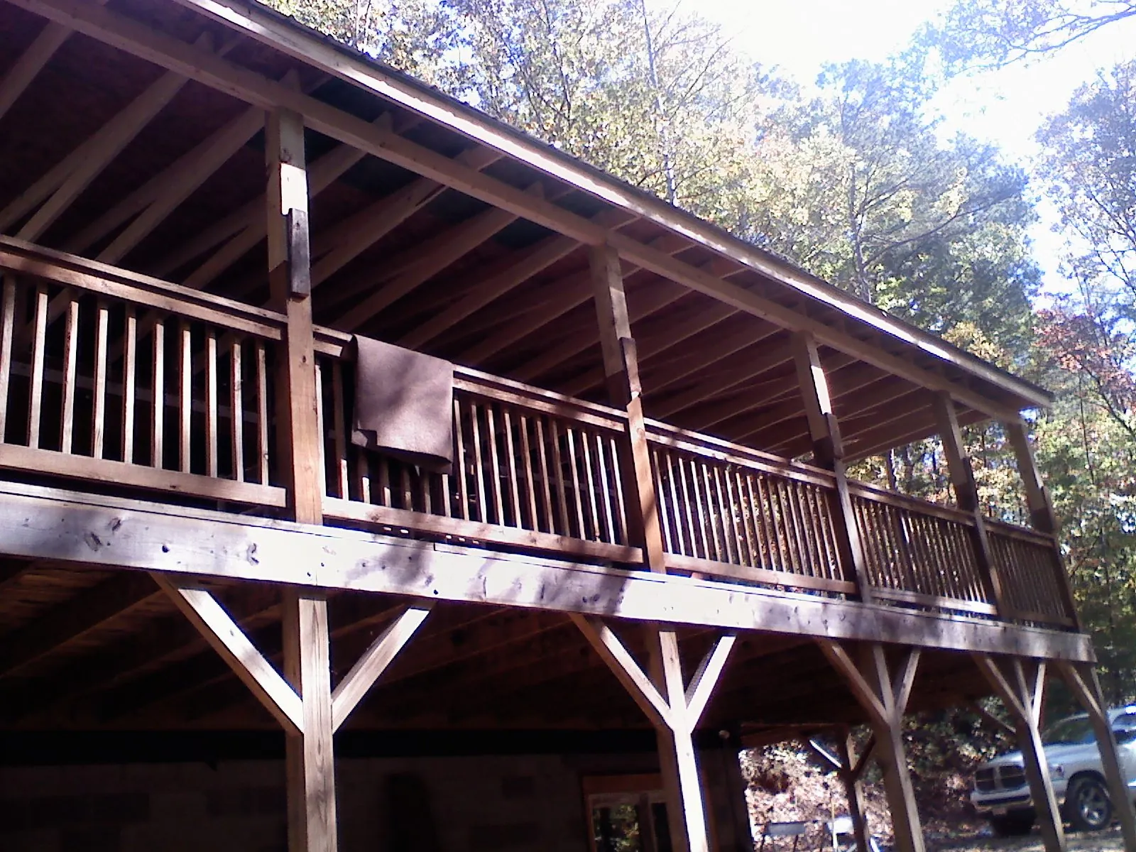 Timber framing under a new elevated porch and deck — Roof Leak Repair in Tiverton by Roofing Brothers